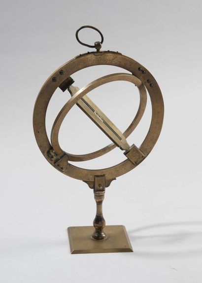 Engraved brass astronomical ring, indicating...