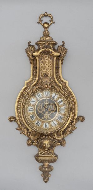 Cartel d’applique en bronze doré et ciselé,...