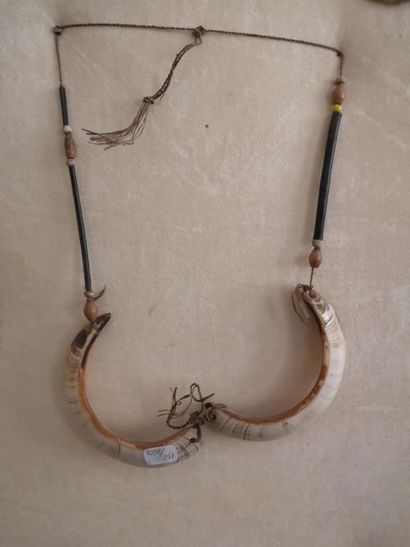 ASMAT, Irian Jaya, Indonésie

Collier en...
