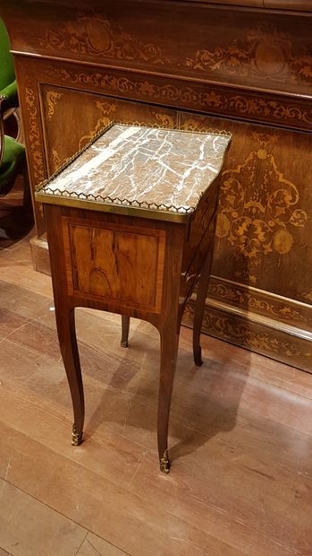 
A veneered chiffonier table opening with...