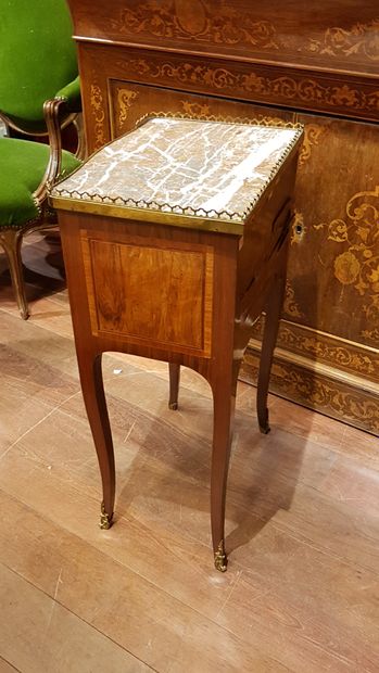 
A veneered chiffonier table opening with...