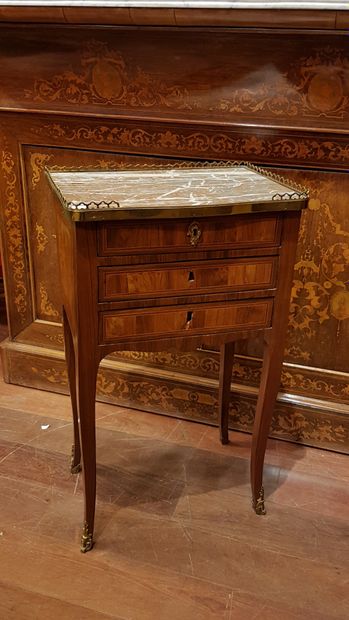 
A veneered chiffonier table opening with...