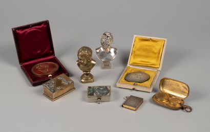 Silver and metal showcase items including:...