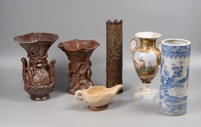 Two terracotta vases with plant and vine...