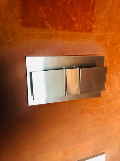 Work from the 70's

Wall lamp

Brushed steel

H:...