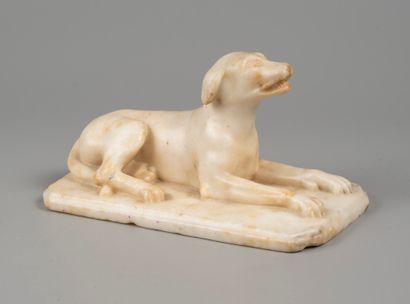 White marble paperweight representing a dog...