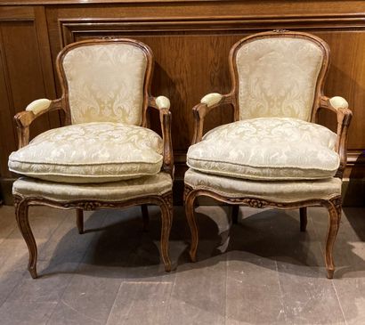 A pair of cabriolets armchairs in natural...
