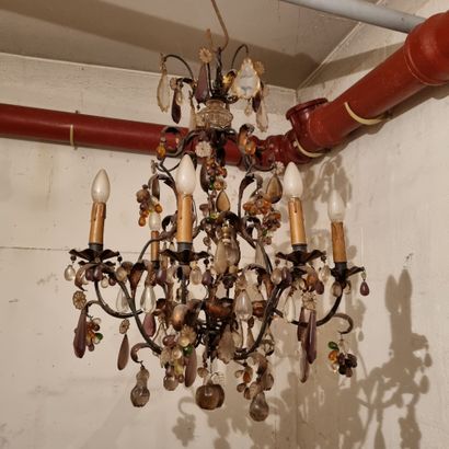 An eight lights chandelier in sheet metal...