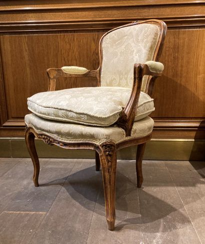A pair of cabriolets armchairs in natural...