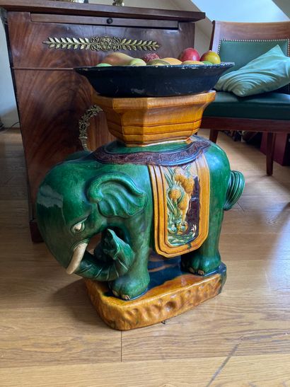 Green and yellow glazed earthenware elephant...