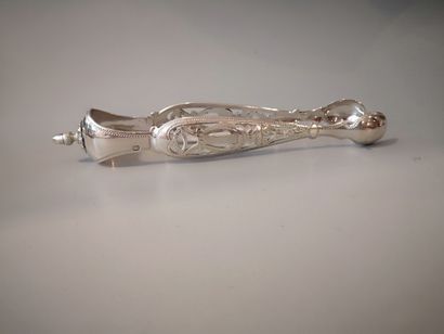 Silver sugar tongs in the form of a lyre....