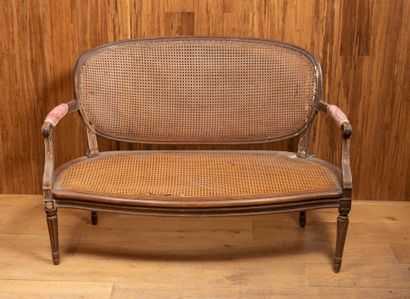 Suite of three carved and painted wood armchairs.

Louis...