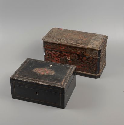 Two boxes, one in blackened wood veneer,...