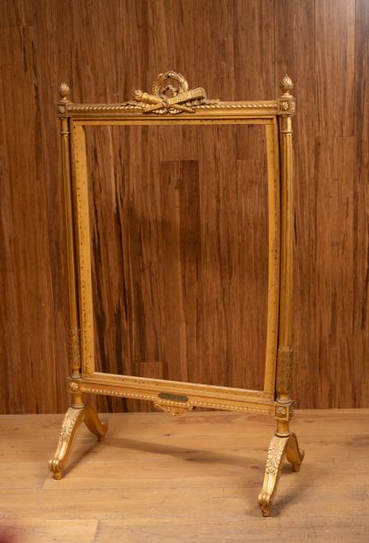 Gilded wood mantel screen decorated with...