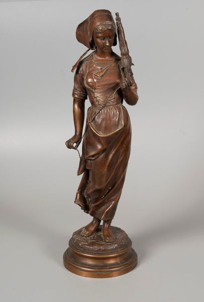 Bronze group with a medal patina showing...