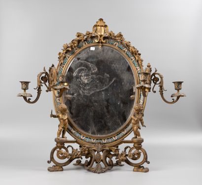 Dressing table mirror.

Bronze and enamelled...