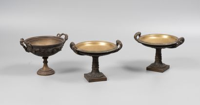 Three cups on pedestal in the taste of the...