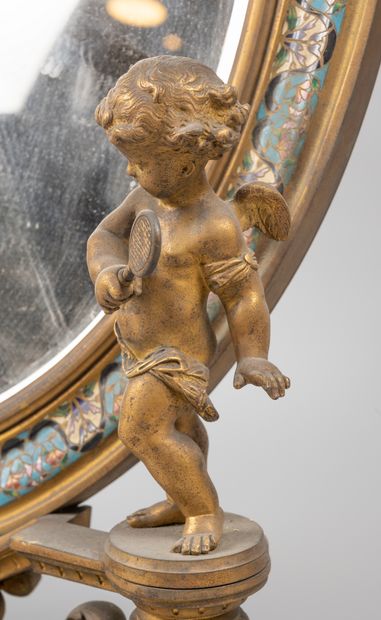 Dressing table mirror.

Bronze and enamelled...