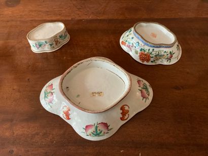 CHINA

Set of two poly-lobed bowls and an...