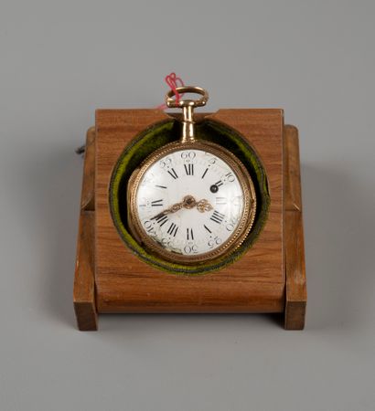 Gold pocket watch.

Rooster movement signed...