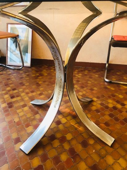 Dining room set including a table with steel...