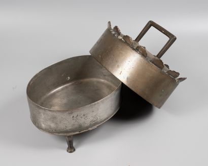 A tripod bronze dauber.

Late 18th - early...