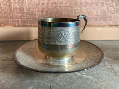 Silver set including a cup, a saltcellar,...