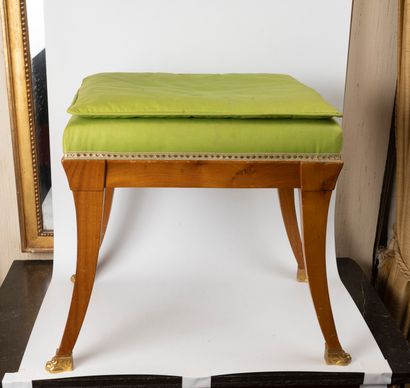 Suite of four wooden stools, gilded bronze...