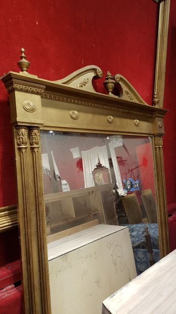 Large pedimented overmantel with a gilded...