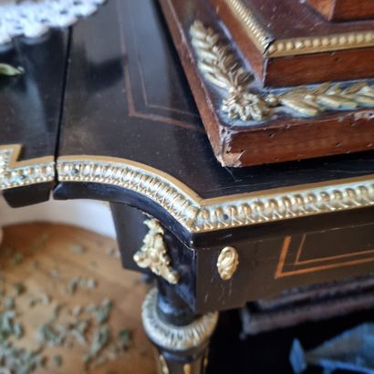 Table with shutters in blackened wood. 

Napoleon...