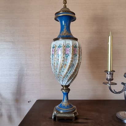 Pair of porcelain vases, mounted in bronze....
