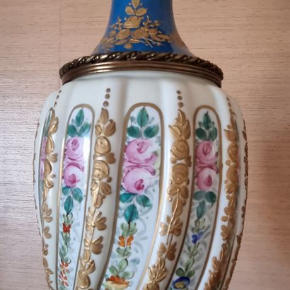 Pair of porcelain vases, mounted in bronze....