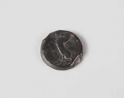 Pièce à décor d'un cheval et un profil