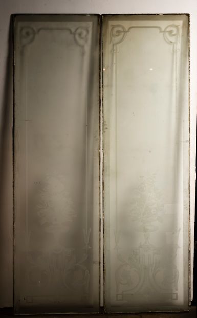 
Suite of three engraved glass tiles with...