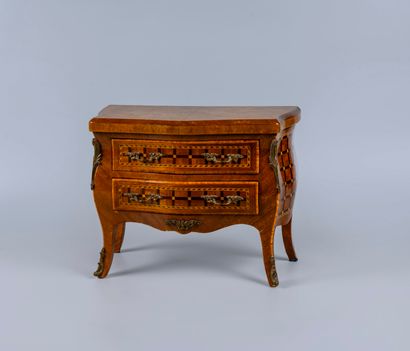 Wood veneer chest of drawers, opening with...