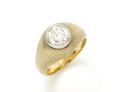 Bague jonc en or 750 millièmes finement ciselé...