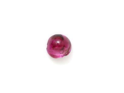 Cabochon de rubis sur papier.
Poids du rubis:...