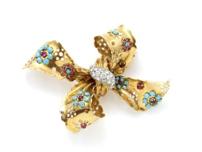 Broche clip en or 750 millièmes, stylisant...