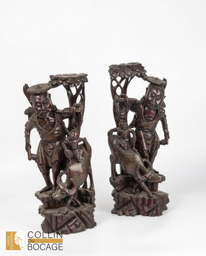 China 20th century 
Two figures pulling buffaloes...