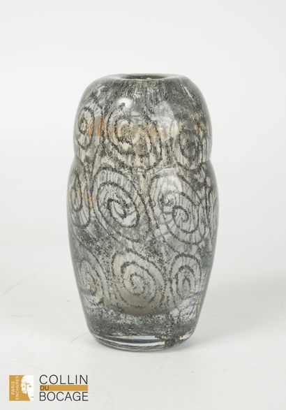 Glass obus vase with metal inlay.
Height...