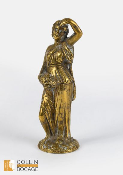 Roman woman with a bunch of grapes. 
Gilded...