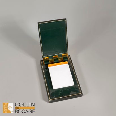 HERMÈS 
Green leather and gilt metal notepad....