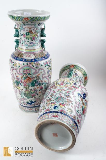 Pair of porcelain vases decorated with palace...