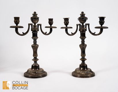 Pair of two-light silver-plated candlesticks,...