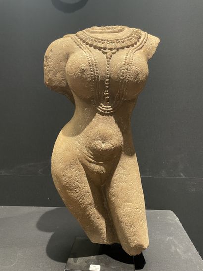 NORTHERN INDIA, 12th century. Headless female...