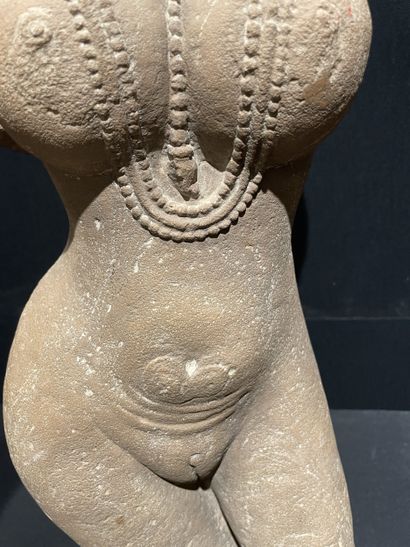 NORTHERN INDIA, 12th century. Headless female...