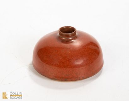 CHINA, 20th century
Red-brown glazed ceramic...