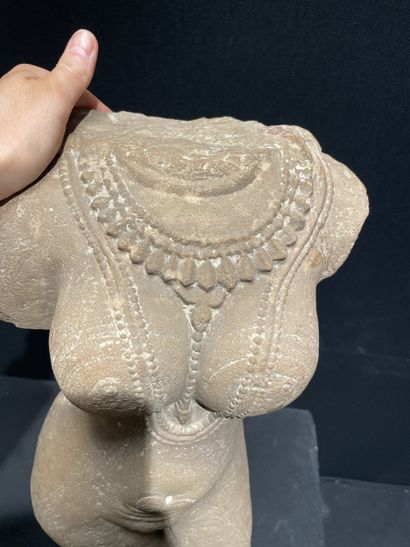 NORTHERN INDIA, 12th century. Headless female...