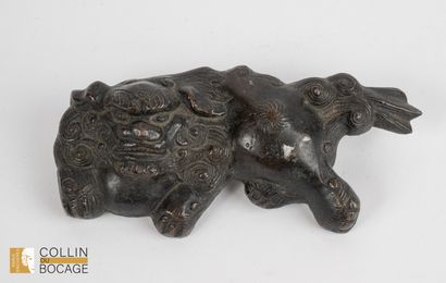 TIBET, 20th century.
Applique ornament representing...