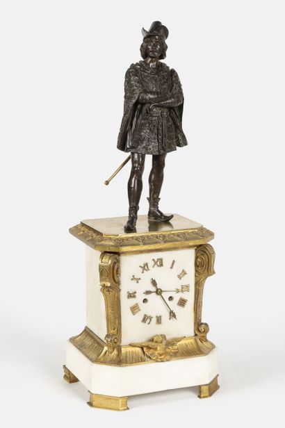 Pendule borne à console, surmontée d'un mousquetaire
Bronze,...